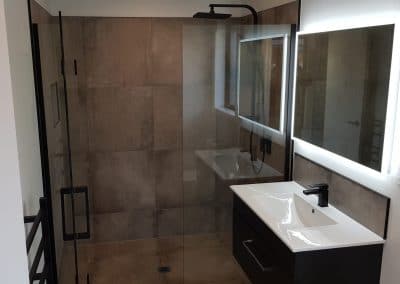 Bathroom shower and splashback tiling