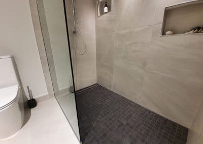 Bathroom shower base tiling